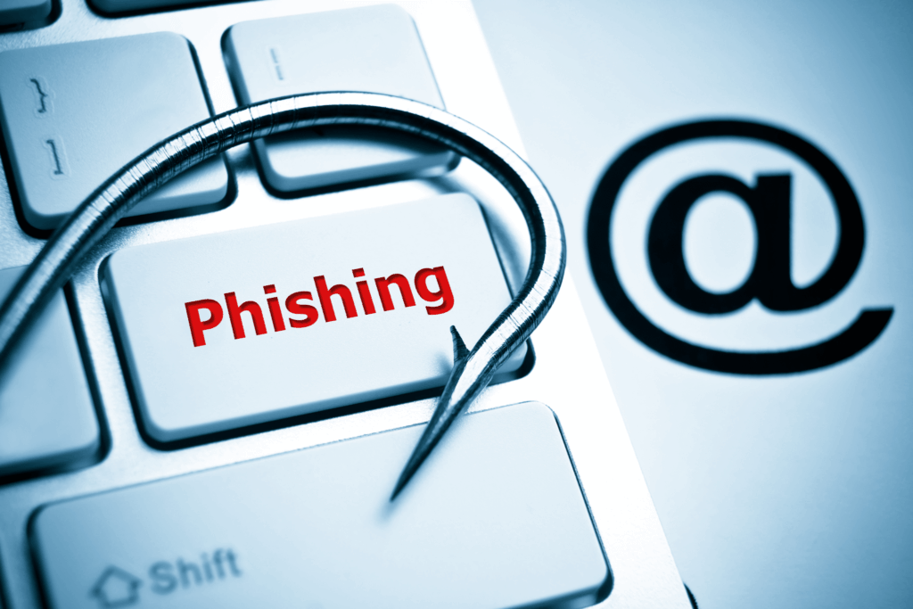 phishing button on keyboard with hook and @ symbol